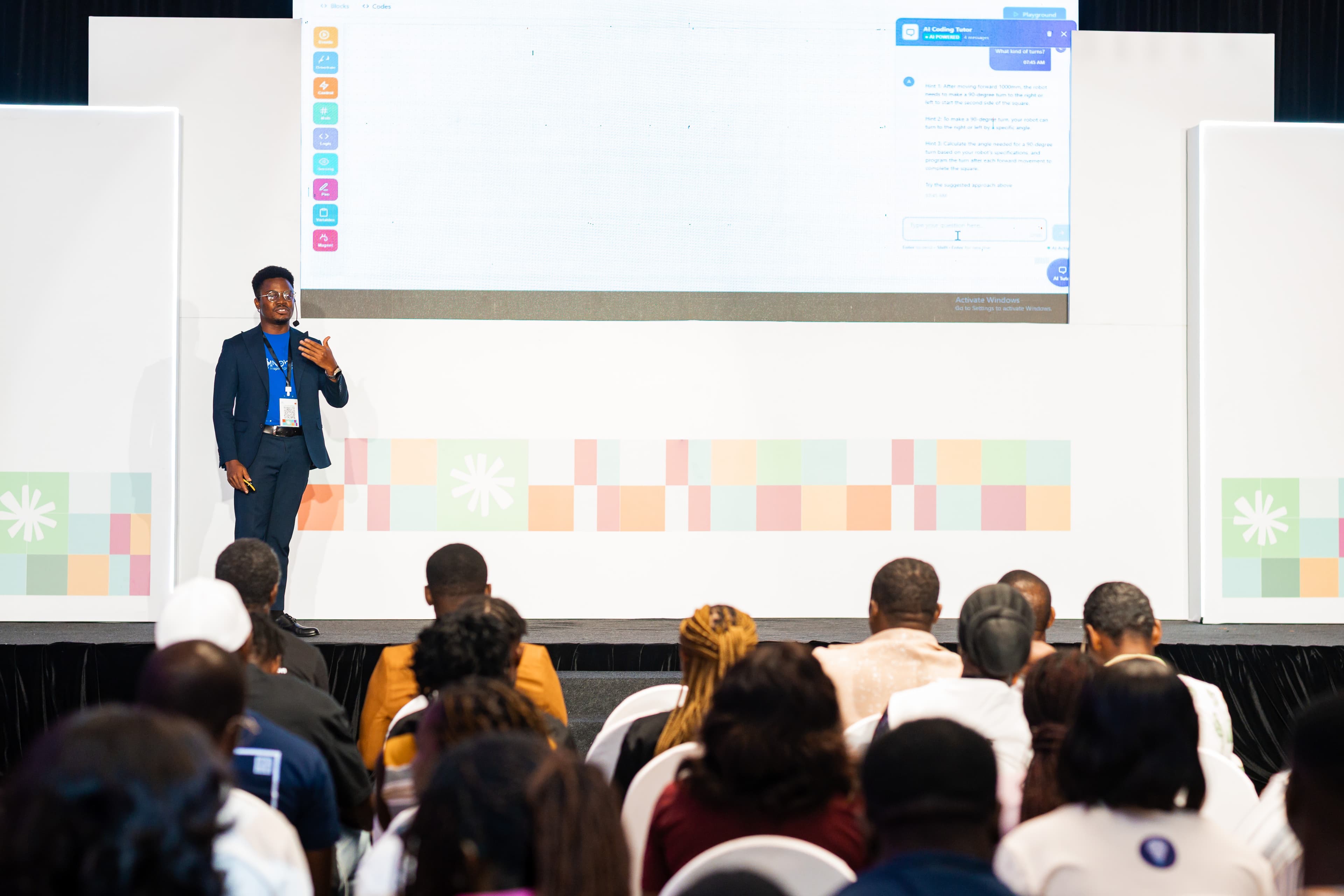 Jonathan Kennedy Sowah presenting KodeVR to a live audience